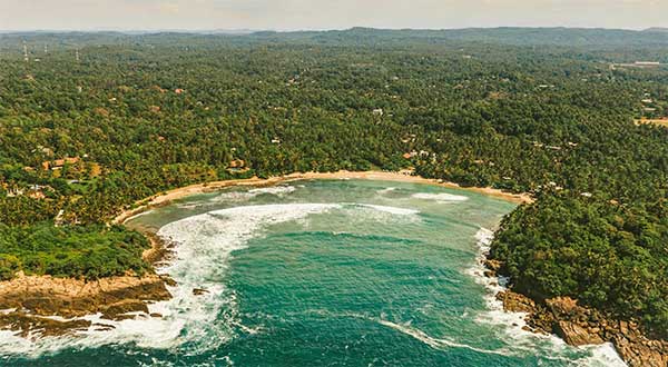 Hiriketiya Bay surfing horseshoe beach Sri Lanka