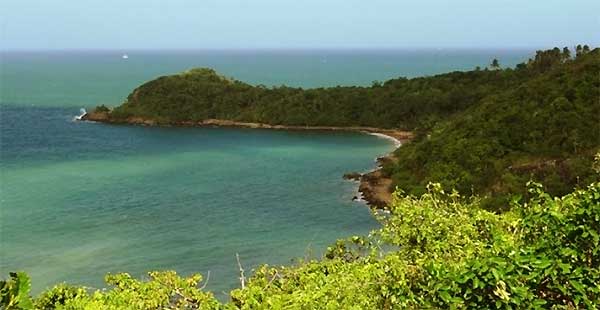 Rumassala Hill lush greenery and ocean views