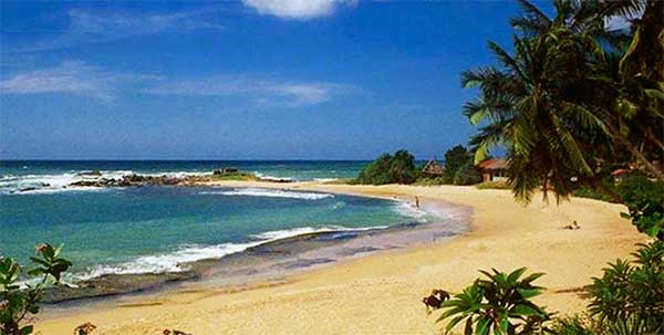 Wide sandy shoreline at Nilaveli Beach near Trincomalee