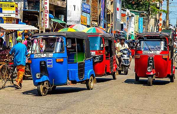 Colorful tuk tuk on a Sri Lankan street