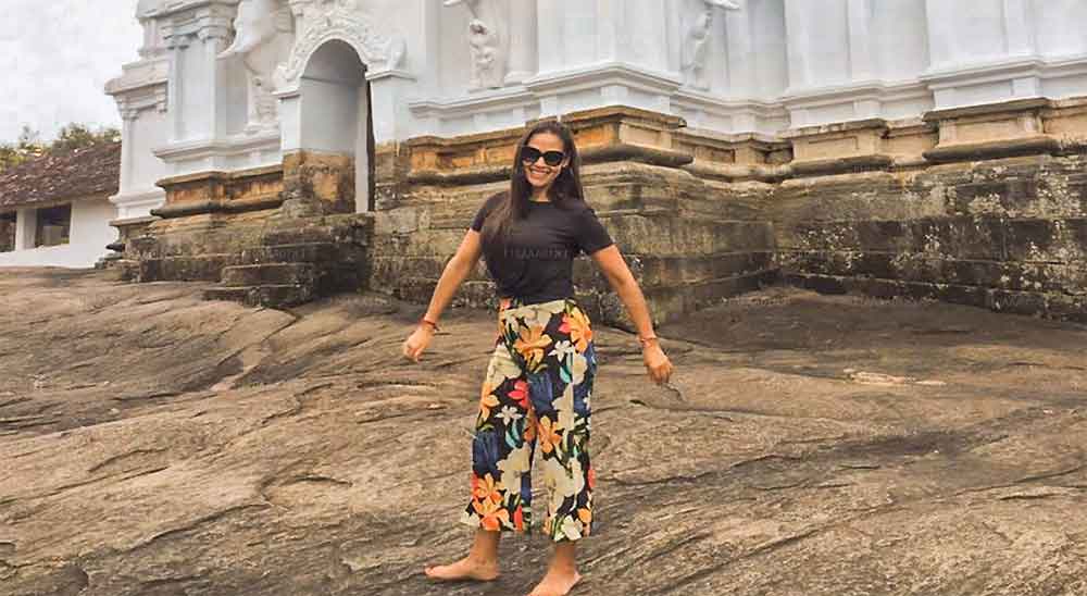 Visitors dressed modestly at a Sri Lankan temple